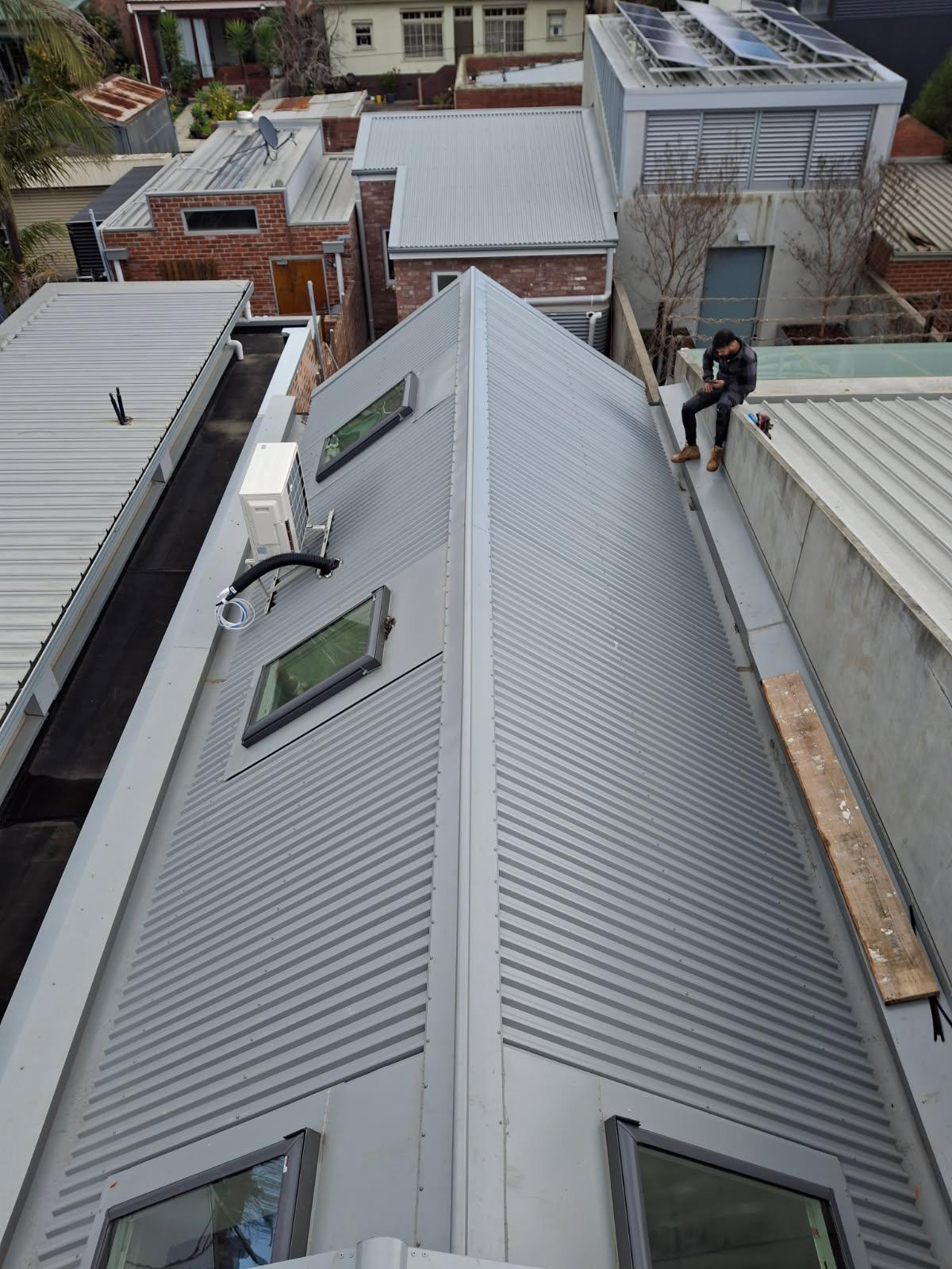 A Velux solar‑powered skylight installed in a residential Brighton home positioned over the kitchen and living room 2