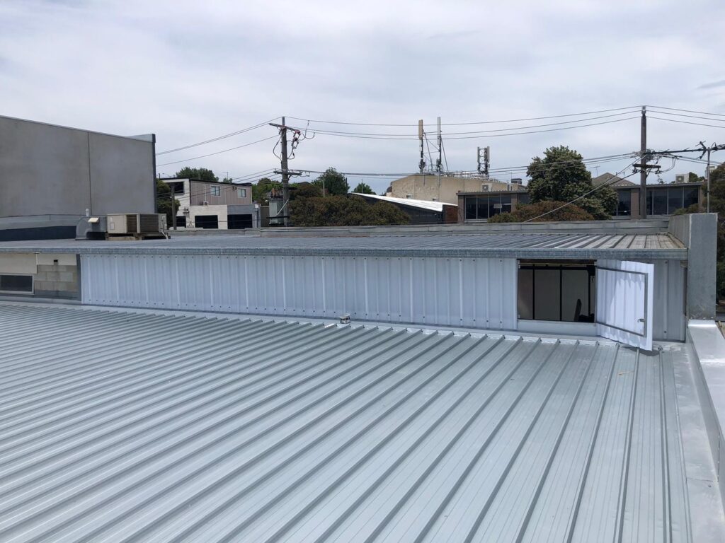 Wall Cladding Skylight Sheets on Commercial Metal Roof